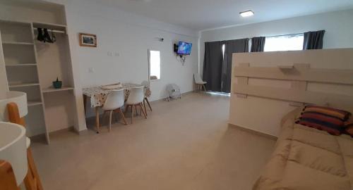 Puerto Madryn Apartment | Delightful Studio with Balcony, Grill & High Guest Rating