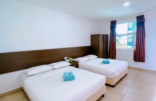 Lubok Buaya Hotel | Budget-Friendly Amzar Motel Cenang: Child Friendly Retreat