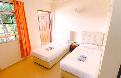 Lubok Buaya Hotel | Budget-Friendly Amzar Motel Cenang: Child Friendly Retreat