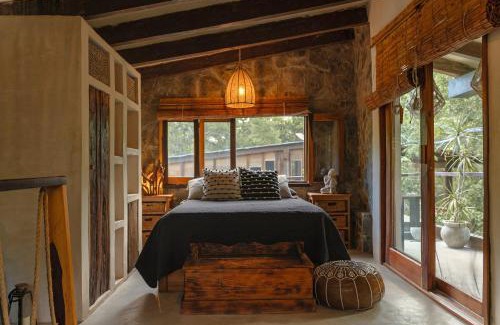 Leona Vicario Cabin | Discover ANAND Ecoaldea: Oceanfront Poolside Paradise