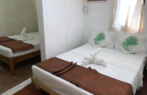 Libaong Resort | Relax at Ananda Resort: Oceanfront Pool & Family-Friendly