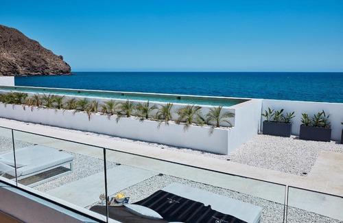Carboneras Ski Chalet | Experience Comfort at Ancón Suites with Oceanfront Views