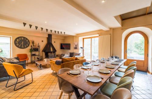 Saint-Pever Villa | Riverside Retreat: Renovated Ancien Moulin for 20 Guests