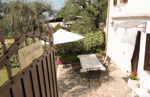 Caprino Veronese House | Idyllic Retreat in Historic Village Near Lake Garda