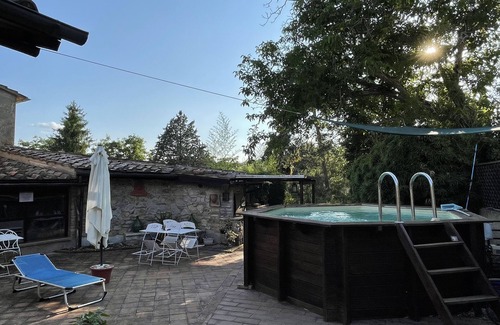 Vescovado Apartment | Relaxing Retreat: Ancient Dwellings at Wisteria Apartments