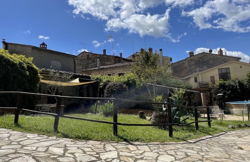 Vescovado Apartment | Relaxing Retreat: Ancient Dwellings at Wisteria Apartments