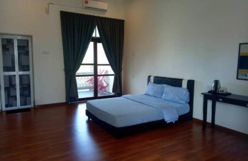 Kampung Ru Muda Hotel | Beachfront Bliss at Andalus Beach Residence - Family Friendly