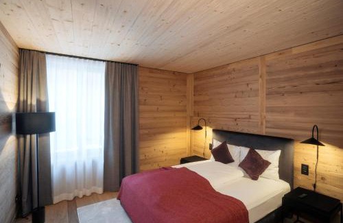 Andermatt Apartment | Cozy Andermatt Alpine Apartments with Breakfast & Family Fun