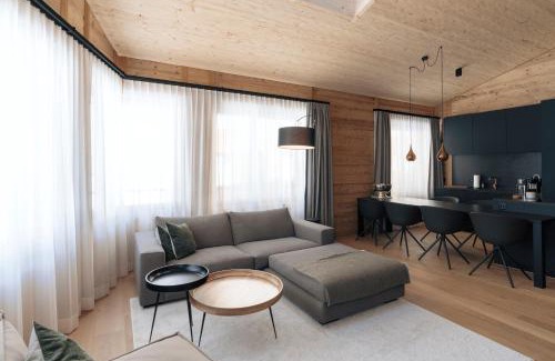 Andermatt Apartment | Cozy Andermatt Alpine Apartments with Breakfast & Family Fun