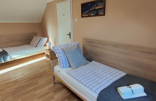 Szajk Apartment | Cozy Andika Apartman Szajk: Family-Friendly Comfort Awaits