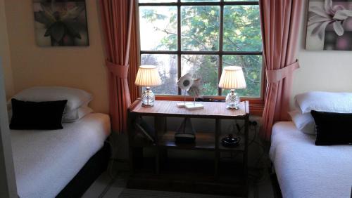 Stanley House | Relax at Touchwood Cottages: 4-Star Retreat with Dining