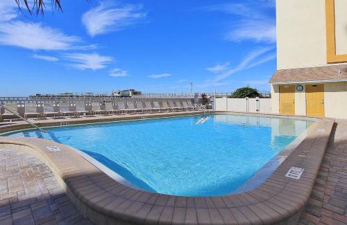 Redington Shores Apartment | Experience Anglers Cove 602: Poolside Paradise Awaits