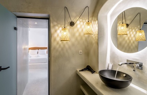 Fira House | Discover Anila Suites: Family-Friendly Hotel with Dining