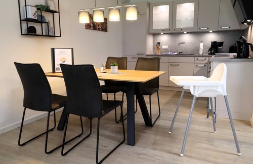 Dorumer Neufeld Apartment | Discover Ankerpunkt Südost: Garden Retreat with Sauna