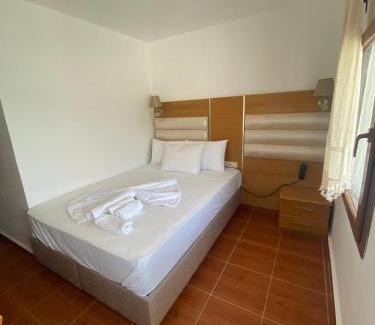 Kiyikislacik Hotel | Discover Antique İasos Boutique Hotel with Ocean Views