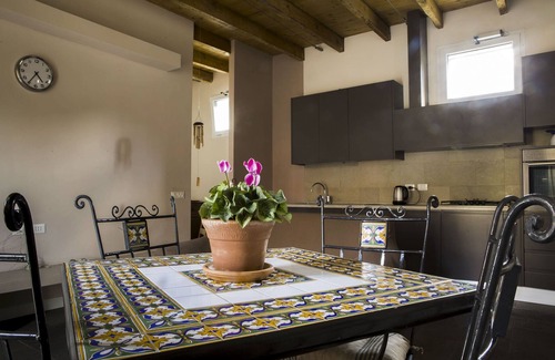 Porta Romana Apartment | Elegant Antico Borgo Apartment with Spa and Kitchen Amenities