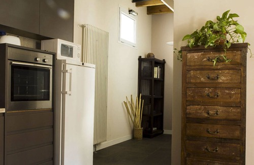 Porta Romana Apartment | Elegant Antico Borgo Apartment with Spa and Kitchen Amenities