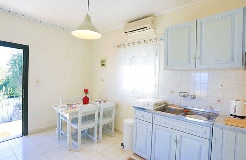 Koutsi Apartment | Relax at Antigoni Villa Ena: Pool, Ocean Views & A/C