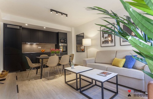 Atocha Apartment | Stylish Antonio Lopez XV Apartment with Spa & Family Amenities