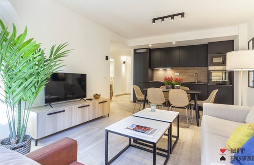 Atocha Apartment | Stylish Antonio Lopez XV Apartment with Spa & Family Amenities