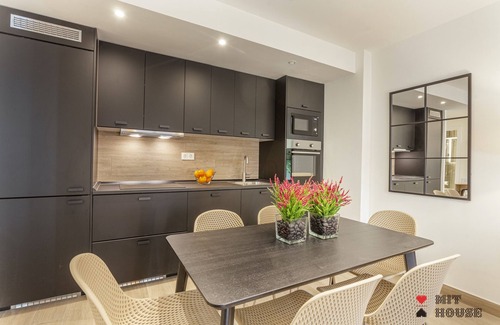 Atocha Apartment | Stylish Antonio Lopez XV Apartment with Spa & Family Amenities
