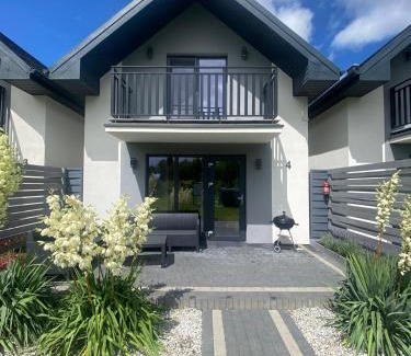 Leba House | Discover Antracytowy Zakątek: Family-Friendly Oceanfront Retreat