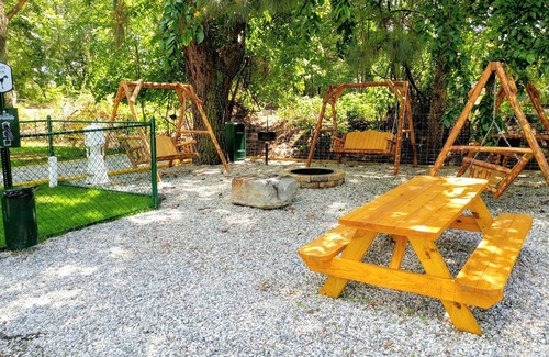 Williamsburg Cabin | Discover Anvil Campground: Pet-Friendly with Pool and Ocean Views