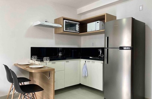Centro Apartment | Convenient AP 1422 with Pool, Gym, and Co-Working Space