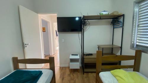 Jardim Praiano Apartment | Cozy Getaway Near Praia Enseada with Free WiFi and Pet Access