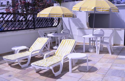 Jardim Praiano Apartment | Top-Rated Ap Enseada: Pool, Ocean View & Free Wi-Fi