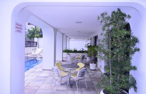 Jardim Praiano Apartment | Top-Rated Ap Enseada: Pool, Ocean View & Free Wi-Fi