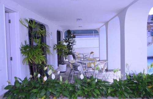 Jardim Praiano Apartment | Top-Rated Ap Enseada: Pool, Ocean View & Free Wi-Fi