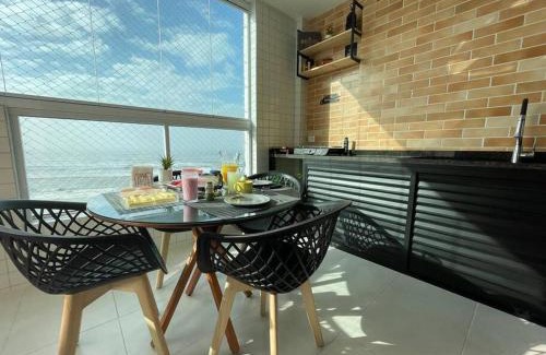 Vila Anhanguera Apartment | Oceanfront Escape with Air Conditioning and Gourmet Balcony