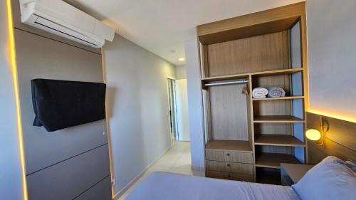 Vila Anhanguera Apartment | Oceanfront Escape with Air Conditioning and Gourmet Balcony