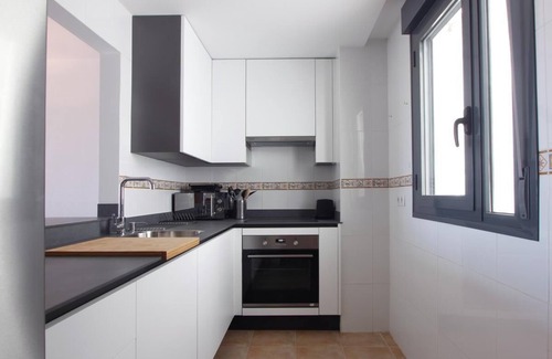 Conil de la Frontera City Center Apartment | Modern Apartment Ap. Nil with Pool & Rooftop Views
