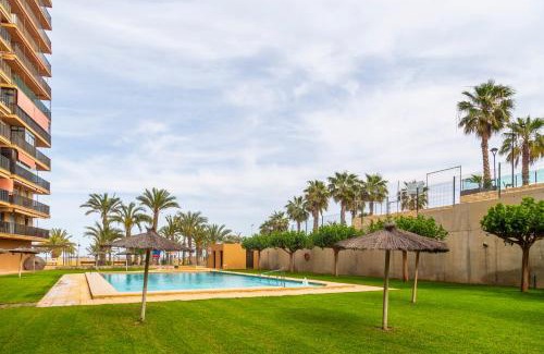 Els Arenals del Sol Apartment | Indulge in AP Over the Sea with Oceanfront Pool Bliss