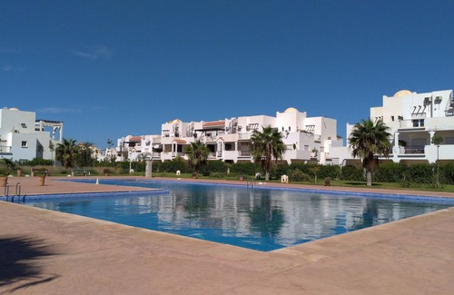 Marina Apartment | Relaxing Stay at Ap8.Chez Younès: Pool & Ocean Views