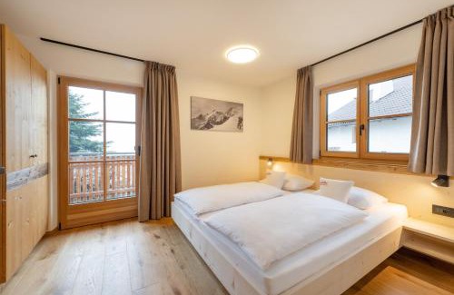 Perdonig/Predonico Apartment | Pet-Friendly Apartments Schmalzerhof with Pool & Ocean View
