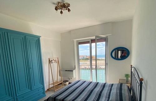 Castiglione della Pescaia Apartment | Canal View Apartment - Family-Friendly with Kitchen Access