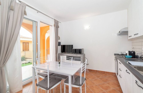 Trinita d'Agultu Apartment | Oceanfront Apartment 'Green Garden F1' with Pool & Wi-Fi