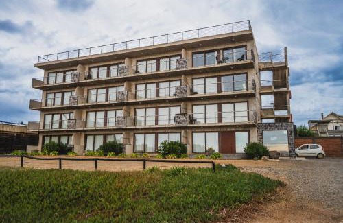 Pichilemu Apartment | Oceanfront Departamentos Kudun: Rated 9/10 & Pet Friendly