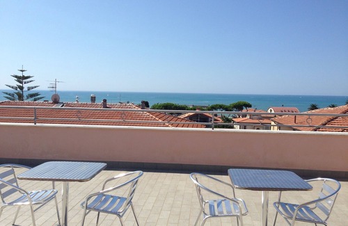 Castiglione della Pescaia Apartment | Cozy Apartment Steps from the Sea with Oceanfront Views