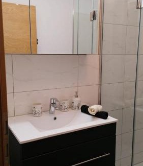 Schlitters Apartment | Discover Apart Kröll: Oceanfront Retreat with Hot Tub