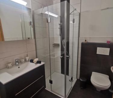 Schlitters Apartment | Discover Apart Kröll: Oceanfront Retreat with Hot Tub