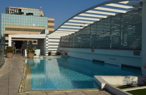 Providencia Apartment | Family-Friendly Apart Lyon Suite with Oceanfront Pool