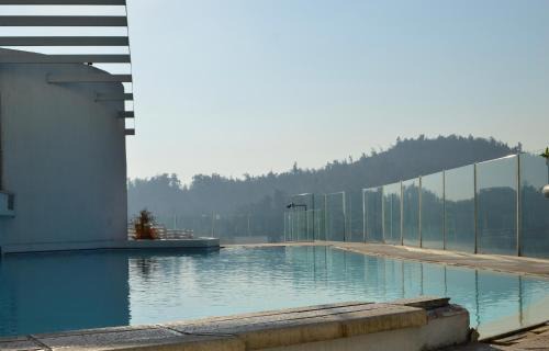 Providencia Apartment | Family-Friendly Apart Lyon Suite with Oceanfront Pool