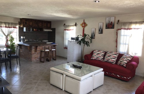 Cholula Apartment | Inviting Apartment with Terrace, Spa & Family-Friendly Comfort