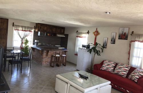 Cholula Apartment | Inviting Apartment with Terrace, Spa & Family-Friendly Comfort