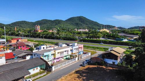Praia da Armacao do Itapocoroi Apartment | Guest Rated 9.7: Apart Pousada Villa das Flores Awaits