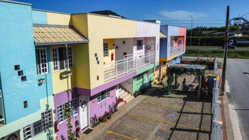 Praia da Armacao do Itapocoroi Apartment | Guest Rated 9.7: Apart Pousada Villa das Flores Awaits